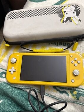 Nintendo Yellow Handheld Console with Pikachu Travel Case
